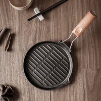 Round Ribbed Cast Iron Pan With Folding Wooden Handle - 24cm - Notbrand